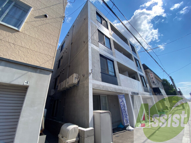 メニーズコート東屯田通の外観