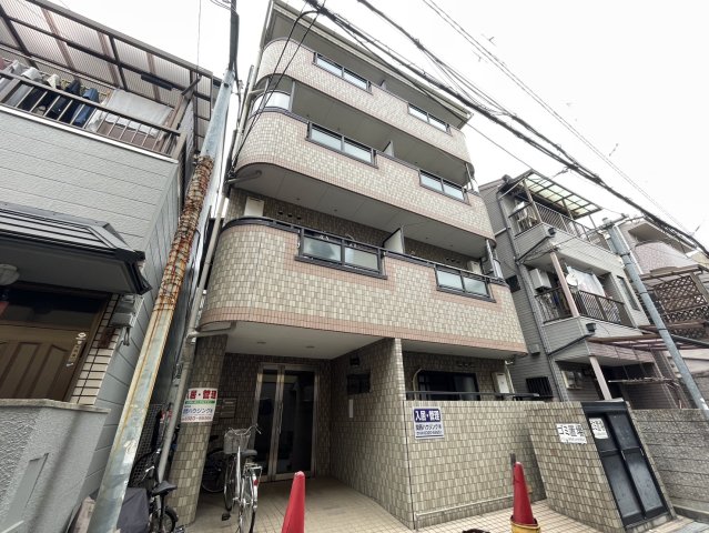 大阪市東淀川区下新庄５丁目の賃貸マンションの外観