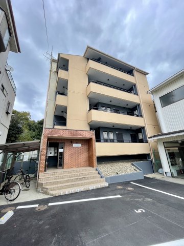 箕面市粟生新家２丁目の賃貸マンションの外観