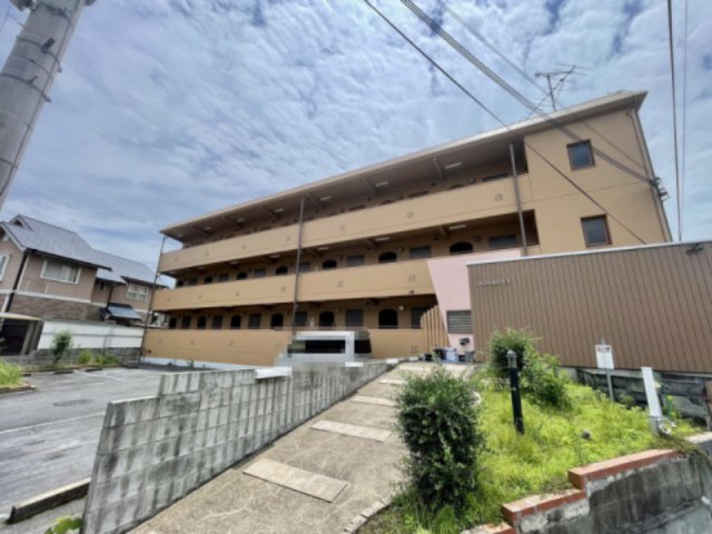 箕面市粟生間谷東５丁目の賃貸マンションの外観