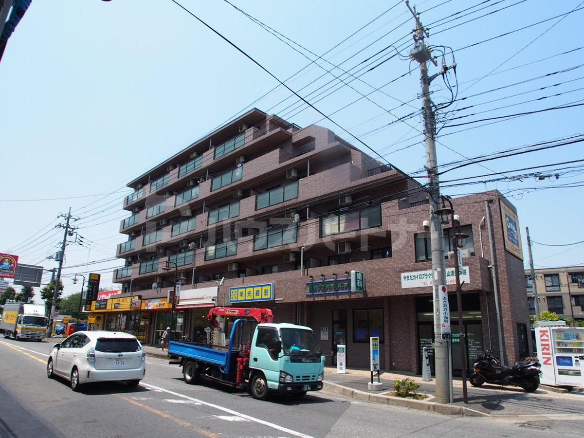 ルミエール飯山満の外観