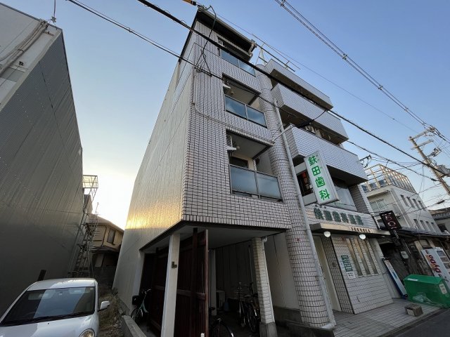 大阪市東淀川区下新庄４丁目の賃貸マンションの外観