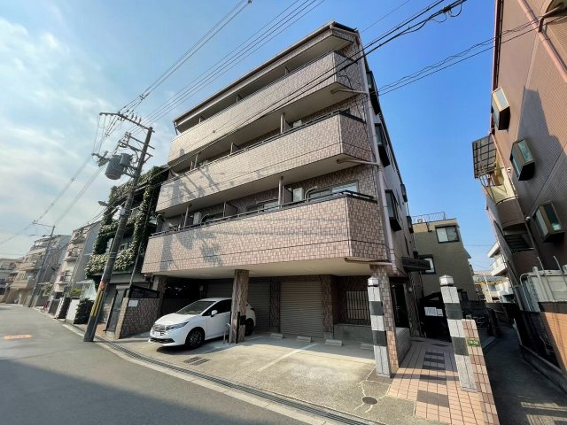 大阪市東淀川区豊新４丁目の賃貸マンションの外観