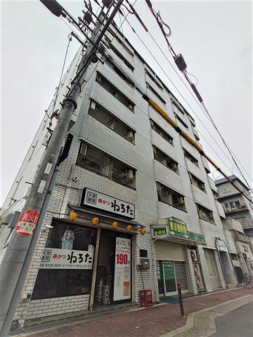 大阪市東淀川区下新庄４丁目の賃貸マンションの外観