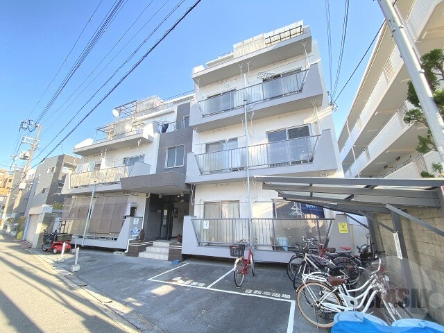 大阪市東淀川区豊新４丁目の賃貸マンションの外観