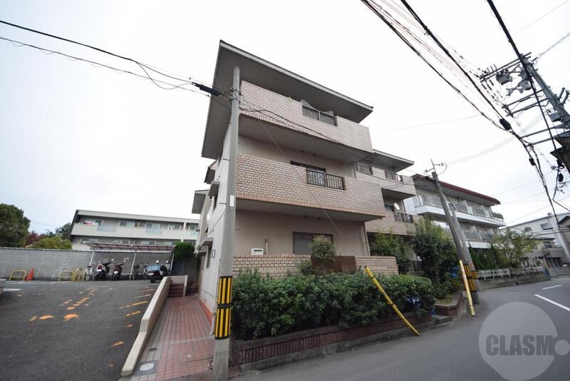 大阪市東淀川区下新庄４丁目の賃貸マンションの外観