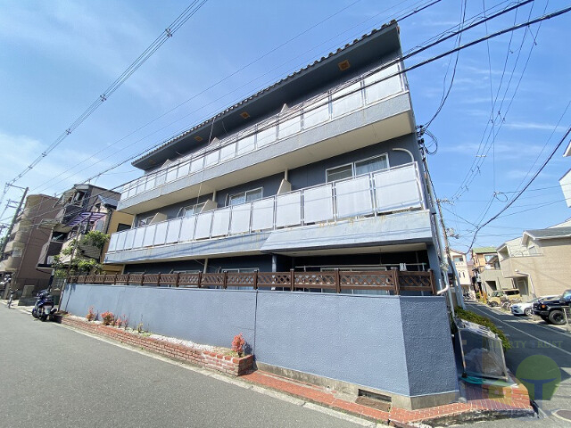 大阪市東淀川区豊新４丁目の賃貸マンションの外観