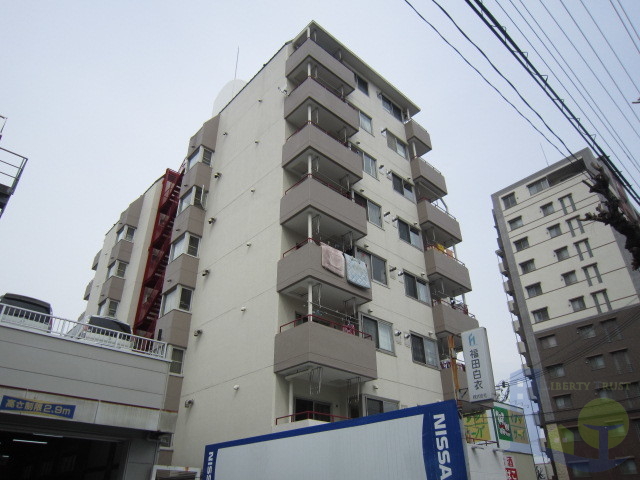 大阪市東淀川区豊新１丁目の賃貸マンションの外観