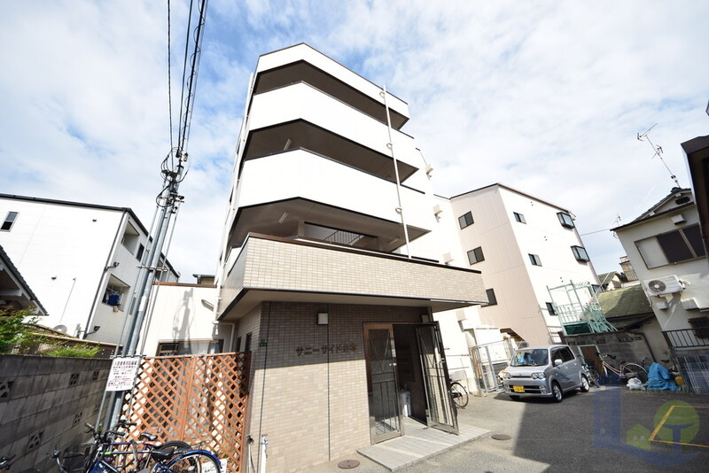 大阪市東淀川区下新庄５丁目の賃貸マンションの外観