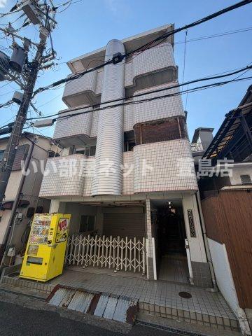 寝屋川市萱島本町の賃貸マンションの外観