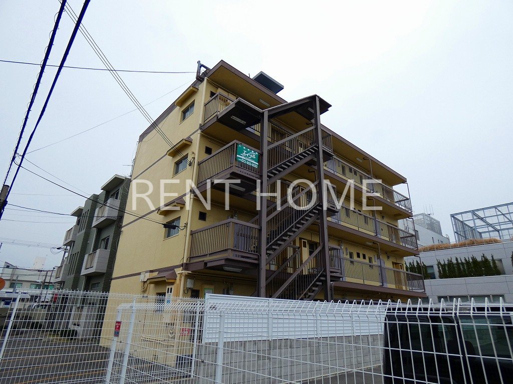 重尾マンション